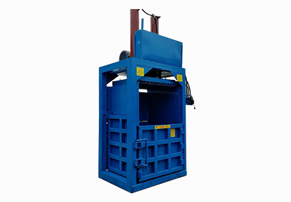 Vertical waste paper baler 